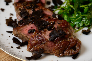 Tagliata di Manzo al Tartufo Sliced Beef Steak with Truffles Served with Green Rocket or Arugula Salad