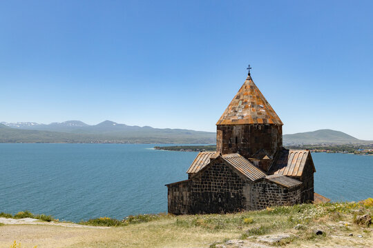 Sevanavank monastery rises beautifully by Lake Sevan, highlighting Armenias history and natural splendor.