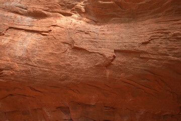 Brown stone rock texture background. Mountains surface. Close-up. Cracked broken crumbled.