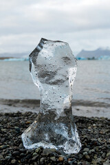 Close-up of piece of ice near glacier lake in Iceland. Jokulsarlon. Wild nature.