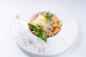 Pasta with Mushrooms, Salmon, Parmesan, and Creamy Sauce