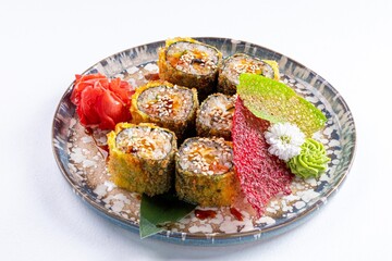 Beautiful Japanese Yellow Fried Sushi Rolls with Shrimp, Ginger, and Wasabi