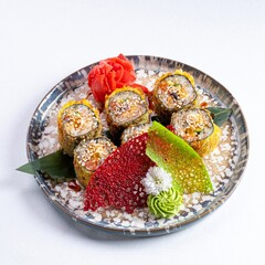 Beautiful Japanese Yellow Fried Sushi Rolls with Shrimp, Ginger, and Wasabi