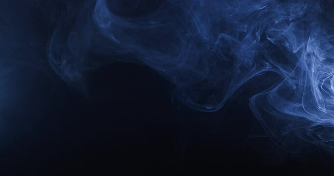 Panoramic view of the abstract fog. White cloudiness, mist or smog moves on black background. Beautiful swirling gray smoke. Mockup for your logo. Wide angle horizontal wallpaper or web banner.