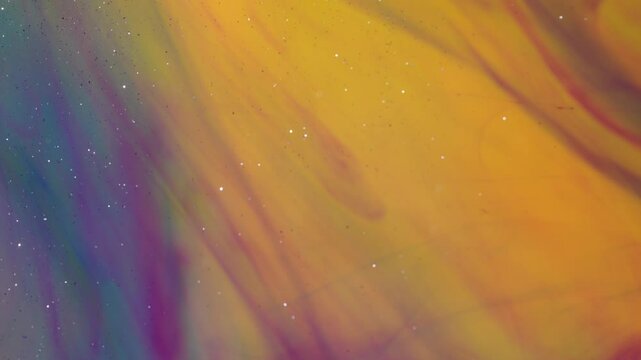 Abstract background. Colored streaks create structures under the influence of water.