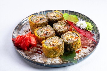 Beautiful Japanese Yellow Fried Sushi Rolls with Shrimp, Ginger, and Wasabi