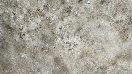 A close-up of a textured concrete surface, resembling a lunar landscape, ideal for concepts of urban decay or construction challenges