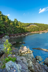 Fototapeta premium Beatuful Landscape with sea, water, trees, bridge and blue sky in South Korea