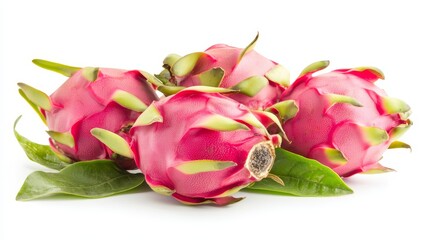 Fototapeta premium three dragon fruit with green leaves on a white background The dragon fruit is a vibrant pink color and the leaves are a deep green The white background provides