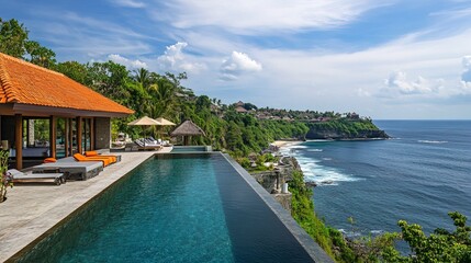 Fototapeta premium Luxurious villa overlooking picturesque bay with infinity pool and private beach 