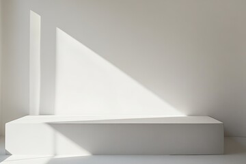 Fototapeta premium The minimalist white podium is empty, blending with the white background.