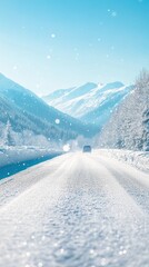 Obraz premium Winter highway in alpine mountains with snowcovered peaks
