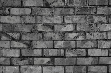 gray texture, in the photo a wall made of old brick