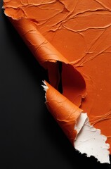 Orange Textured Paper with Black Background and Torn Edge Detail