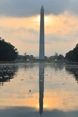 Obraz premium Washington Monument and other monuments during sunrise - Washington D.C. United States