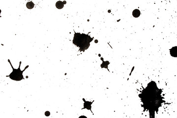 Black Messy Creative Ink Splatters Drips and Inkblot Close Up on White Background
