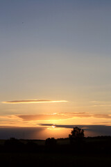 Sunset Over the Field: Nature's Golden Hour