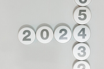 Circle buttons arranged to create 2024, 2025 and beyond