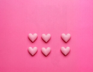 Fototapeta premium Valentine minimal background with pastel pink rose, pink podium on the pink wall