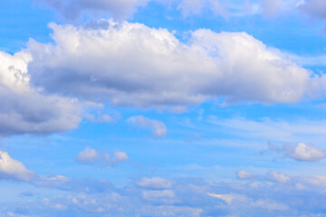 Fototapeta premium The background of the sea by the evening sea, with natural beauty (sea water, rocks, sky) and fishermen are fishing by the river bank, is a pleasure during travel.