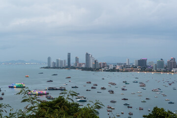 A city with a large body of water in the background