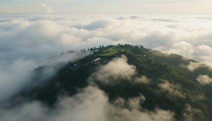 Clouds cover green island drone view. Serene buildings surrounded by morning fog isolated highlighted by white, png