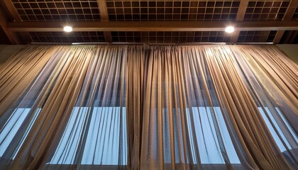 Obraz premium two layers curtain with rails installed on ceiling translucent and blocking lights curtain