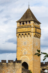 Fototapeta premium One of the fortified towers of the Valentré Bridge crossing the Lot River in Cahors