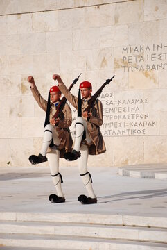 Athens, Greece / September 2023: The presidential palace guard in traditional Greek Tsolias outfit outside the Fallen Soldier monument at Syntagma square. 