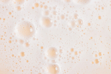 Soapy foam texture. Abstract shampoo light background