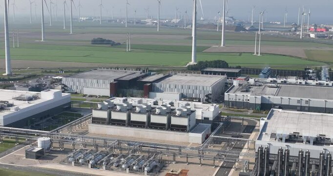 Aerial view of windmills and Large data center in the Eemshaven