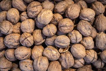 pile of shelled walnuts. bazaar market.