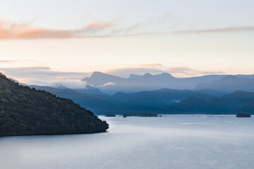 Sunrise over the mountains at Moragahakanda Reservoir Sri lanka