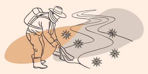 Naklejka premium Gentle Footfalls A silhouette of a person in a hat and scarf steps carefully on a winding trail illuminated by soft afternoon light. The snowflakes sparkle underfoot as they