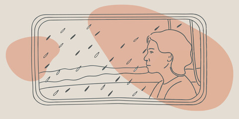 Reflection and Thoughtfulness A side view of the person looking out the window their expression thoughtful. The raindrops create a soft barrier allowing their imagination to wander