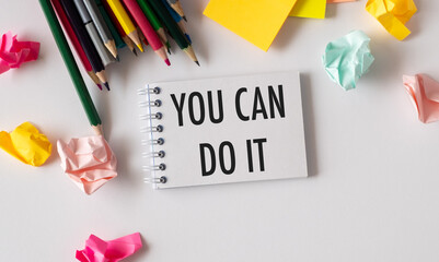 You can do it symbol. Concept word You can do it on beautiful notebook. Beautiful white table white background. Business motivational you can do it concept.