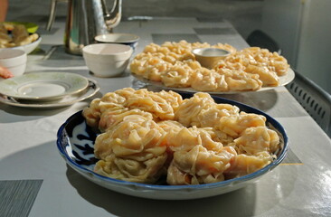 A plate with the traditional Central Asian dish manty.