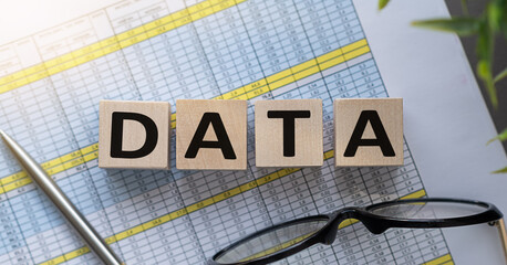 Wooden cube with DATA text. Business concept.