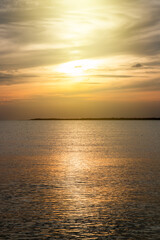 Obraz premium Sunlight shines down on the sea surface.