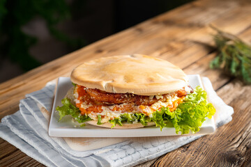 sandwich on a wooden table