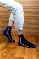 Beautiful blue men's socks on a Interior background