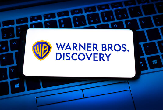 Warner Bros Discovery company logo displayed on smartphone