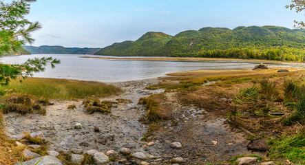A panorama view from the shoreline out across the inlet at Saguenay Fjord National Park, Quebec in Canada in the fall