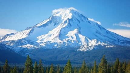 Fototapeta premium Majestic snow-capped mountain against a clear blue sky.