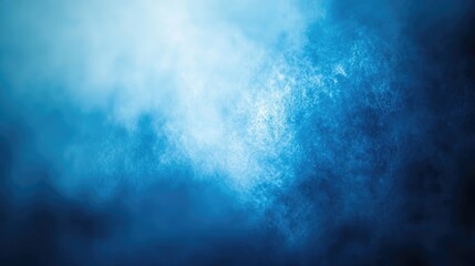 An ethereal blue mist creates a dreamy atmosphere, perfect for backgrounds and abstract themes.