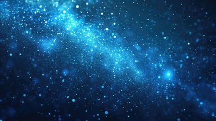 Obraz premium A mesmerizing cosmic scene featuring sparkling blue particles and glowing stars in a deep space background.