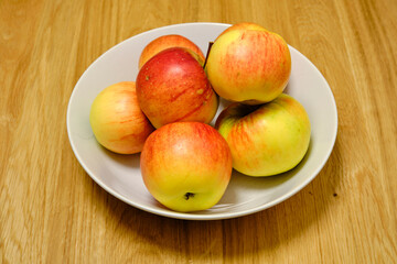 Beautiful, organic, healthy apples on a plate.