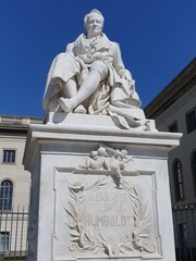 Fototapeta premium Close up of the historic marble statue of the famous German natural scientist Alexander von Humboldt at the campus of Humboldt University, Berlin, Germany