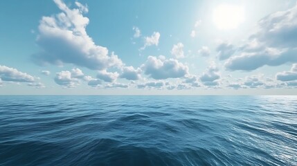 Obraz premium A serene ocean view under a bright sky with fluffy clouds reflecting tranquility.