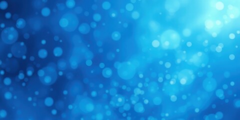 Obraz premium Abstract blue bokeh background with soft circular lights, creating a dreamy and ethereal atmosphere.